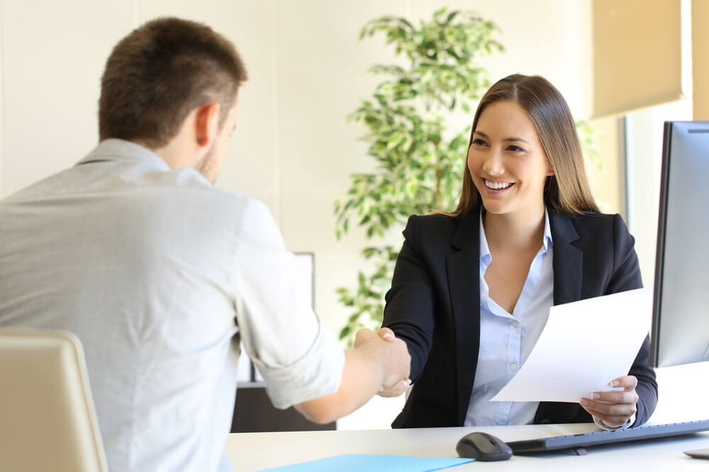 Successful Job Interview With Boss and Employee Handshaking